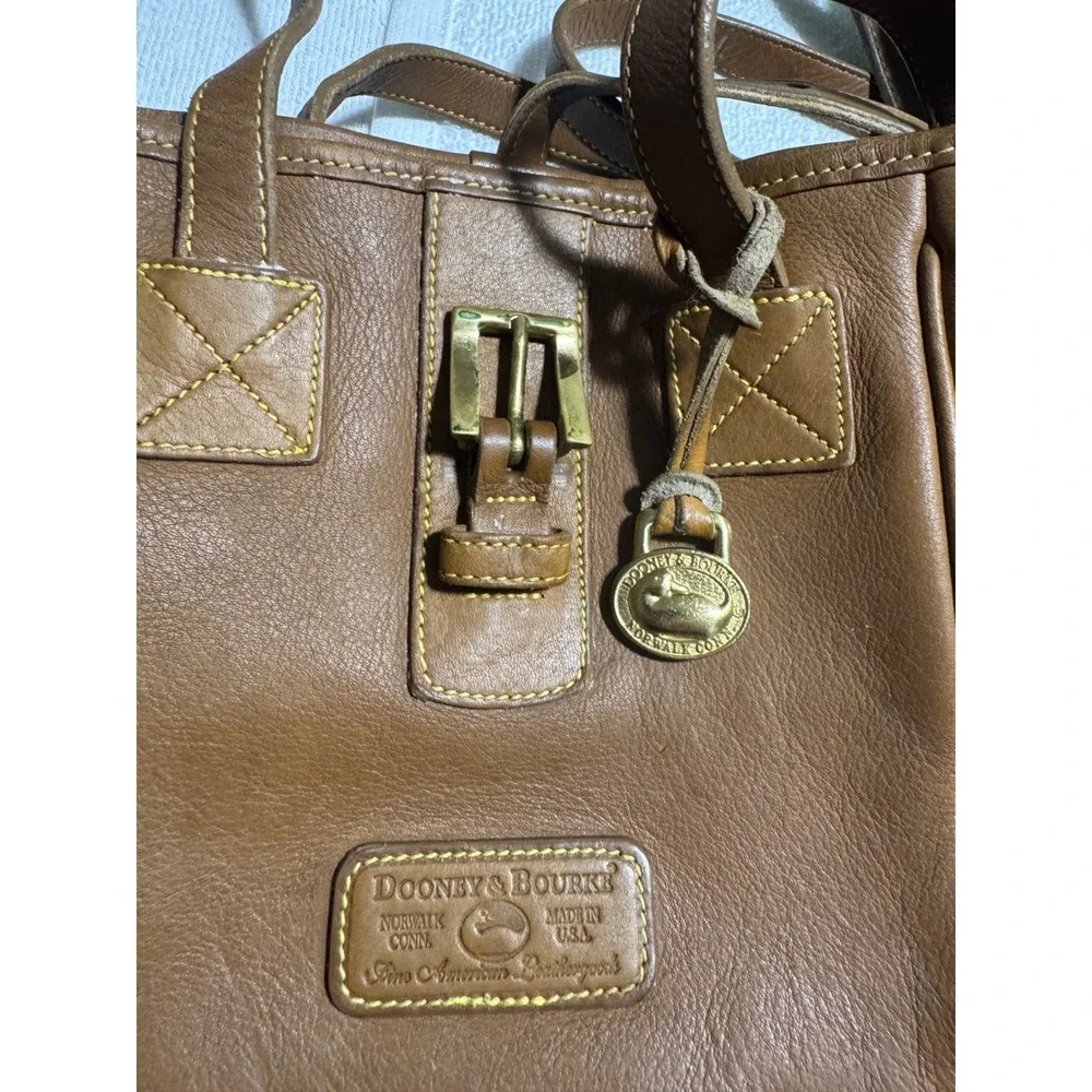 Dooney & Bourke Vintage bucket  Tan Leather Tote Bag Made in USA Brass Duck Fob